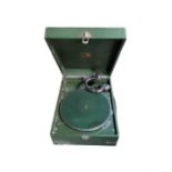 A HMV portable wind-up gramophone in green case wi