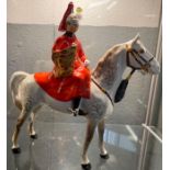 A Beswick figure of a Royal bandsman on a dapple g