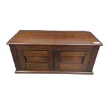 An Edwardian stained wood table top cabinet with p