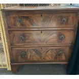 A small veneered chest of three long drawers on br