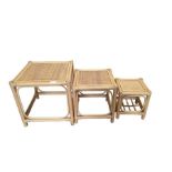 A nest of three bamboo and woven cane tables, 42cm