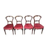 A set of four Victorian stained wood standard dini