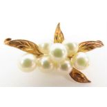 A seven stone set cultured pearl brooch, stamped ‘