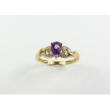 A 9 carat gold amethyst and diamond dress ri