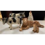 A Melba Ware figure of a Friesian Bull and a cow,