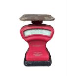 A set of W & T Avery certified postal balance scales with red