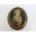 An oval miniature portrait on ivory of a lady in 1
