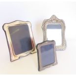 Three modern silver easel backed picture frames