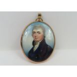 An early 19th century oval miniature portrait on i