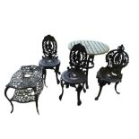 A pair of black painted iron garden chairs, a sing