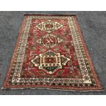 A wool Middle Eastern rug having geometric design