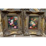 A pair of decorative still life paintings in gilt