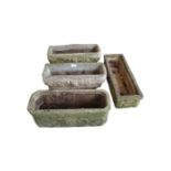 A Sandford stone trough planter together with a pa
