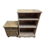 A stripped pine open fronted bookcase 107cms high