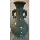 A Chinese celadon glaze two handled vase , 18cms h