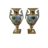 A pair of large Continental two handled pedestal v