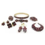 A collection of jewellery set with garnets and gar