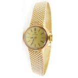 Omega - a ladies vintage 9ct gold wrist watch