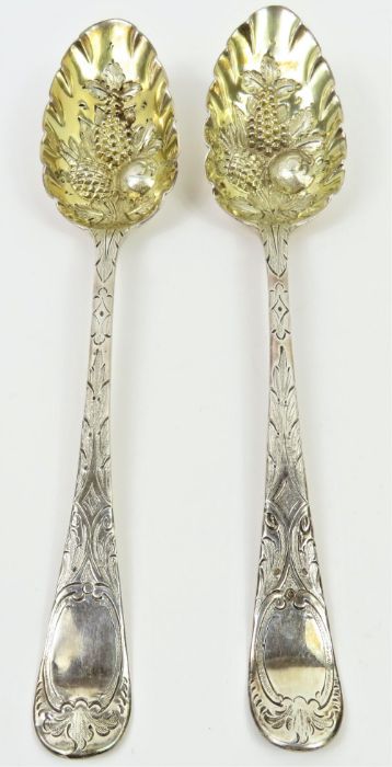 A pair of later decorated berry spoons, Old Englis