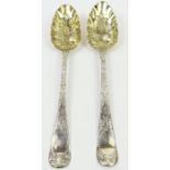 A pair of later decorated berry spoons, Old Englis