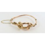 A Victorian hinged knot bangle, 5.5cm internal dia