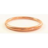 A Victorian rose gold bangle