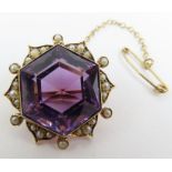 An early 20th century amethyst and seed pearl brooch,