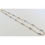 An early 20th century opaline bead necklace, 44cm