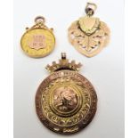 A 9ct gold presentation medal, with a figure of a