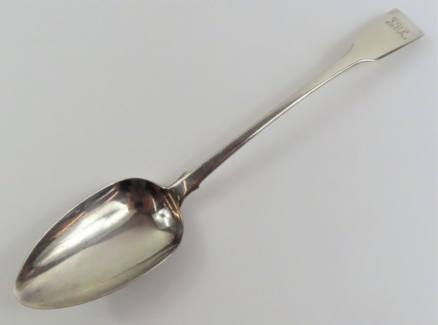 A Georgian silver fiddle pattern basting spoon, by