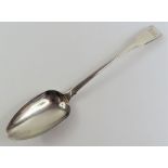 A Georgian silver fiddle pattern basting spoon, by