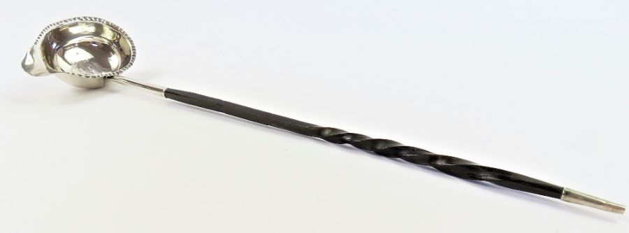 A Georgian toddy ladle, unmarked, coin set lipped