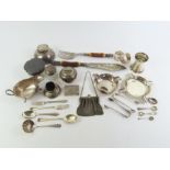 A collection of silver and metal items, including