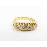 A late Victorian 18ct gold five stone diamond ring