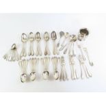 A part canteen of matched silver flatware, in an u