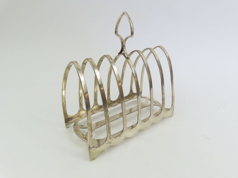 An unusually large silver toast rack, by William H
