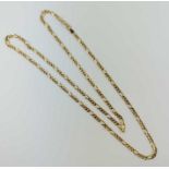 A 9ct gold filed figaro link chain, 74cm long, 16.