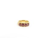 A Gem TV 9 carat gold four stone ruby ring, finger