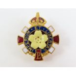 An enamelled on metal lapel badge, 'Libertas et im