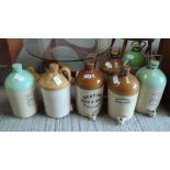 A collection of six various cider stoneware flagons,