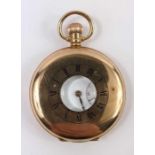 An unnamed 9ct gold half hunter pocket watch, the