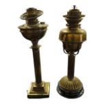 A Victorian brass oil lamp the reservoir fitting i