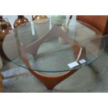 A mid century teak coffee table, with a circular g