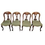 A set of four William IV mahogany dining chairs wi