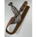 An Oman Jambiya having horn grip with silver metal