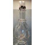 An unusual clear glass four compartment decanter o