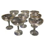 WITHDRAWN A set of eight Babycham glasses