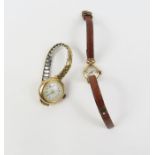 A 9ct gold wristwatch with decorative enamel dial,