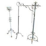 A white painted wrought iron stand together with t