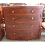 A Victorian mahogany bow front chest of two short